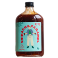Bottle of Sriracha Caramel with a colorful label on a white background