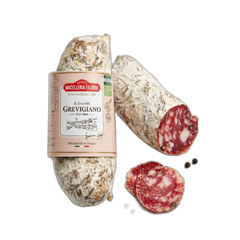Salami with a visible label on a white background
