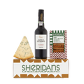 Port bottle, wedge of cheese, and box of crackers on a white background