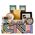 Assorted food items including cheese, salami, and crackers on a colorful box with Sheridan's branding.