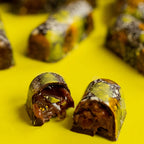 Close-up of a chocolate dessert with a yellow background