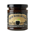 Jar of Irish Black Butter with a black lid on a white background
