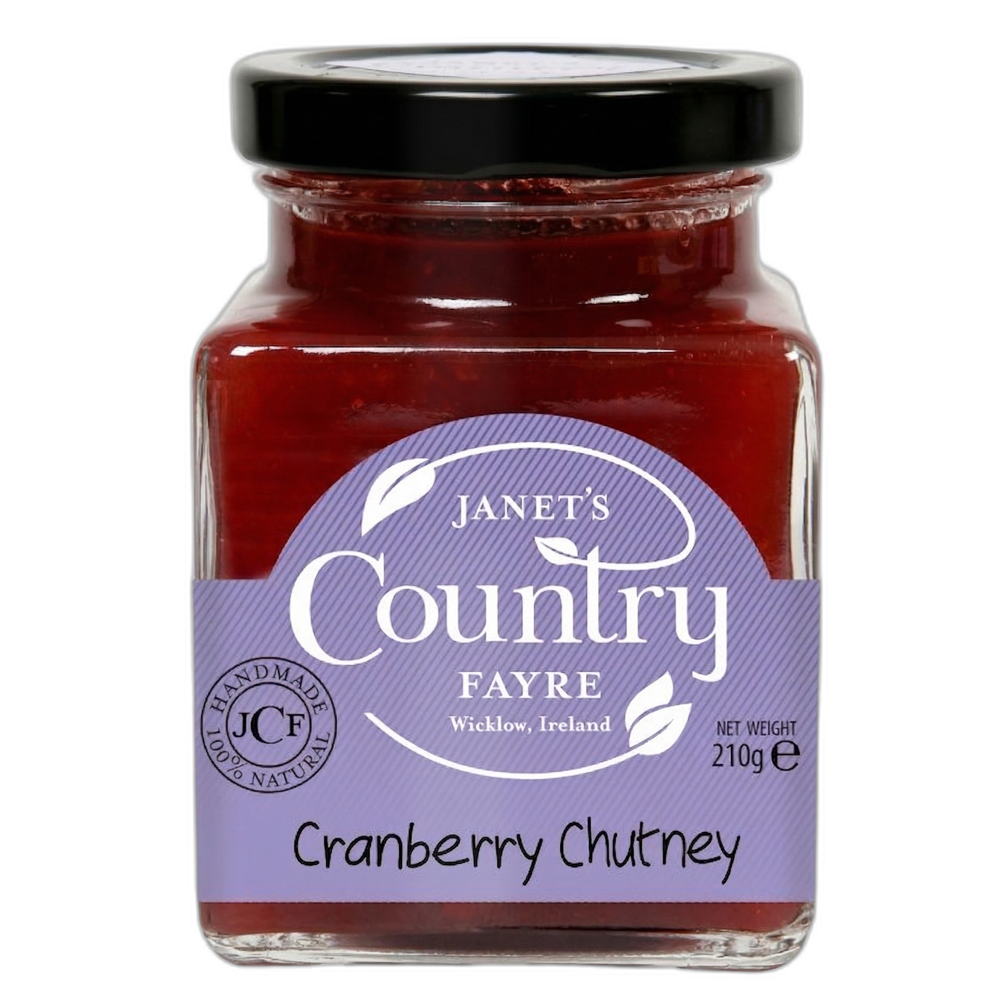 Jar of cranberry chutney with a purple label on a white background