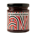Jar of Irish strawberry and balsamic jam with a decorative label on a white background