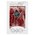 Packaged sliced shoulder of cebo de campo iberico with brand name on white background