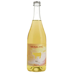 Bottle of Meinklang wine with a label on a white background