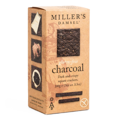 Box of Miller's Damsel charcoal crackers on a white background