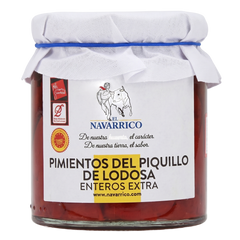 Jar of 'El Navarrico' pimientos del piquillo with a white lid on a white background
