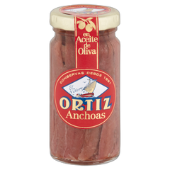 Jar of Ortiz anchovies with a red label on a white background