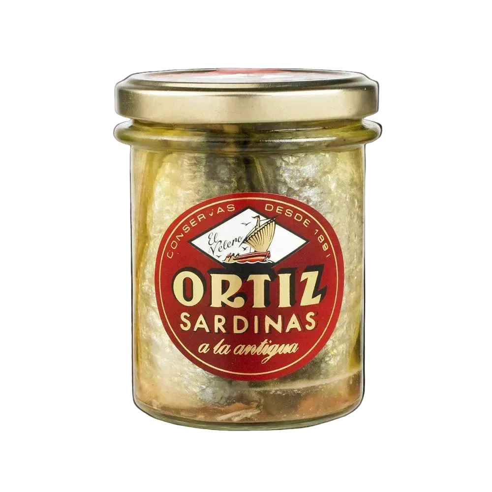 Jar of Ortiz sardines with a red label on a white background