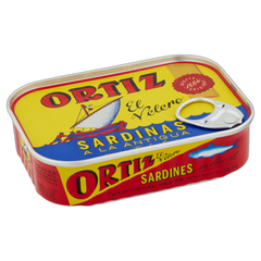 Tin of Ortiz sardines in olive oil on a white background
