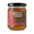 Jar of chestnut blossom honey with a Prunotto label on a white background