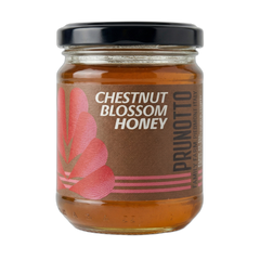 Jar of chestnut blossom honey with a Prunotto label on a white background