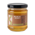 Jar of Acacia Honey with Prunotto label on a white background