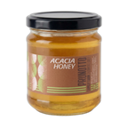 Jar of Acacia Honey with Prunotto label on a white background