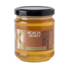 Jar of Acacia Honey with Prunotto label on a white background