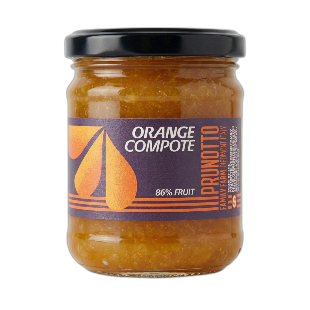 Jar of Orange Compote with a black lid on a white background