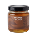 Jar of truffle honey with a black lid on a white background