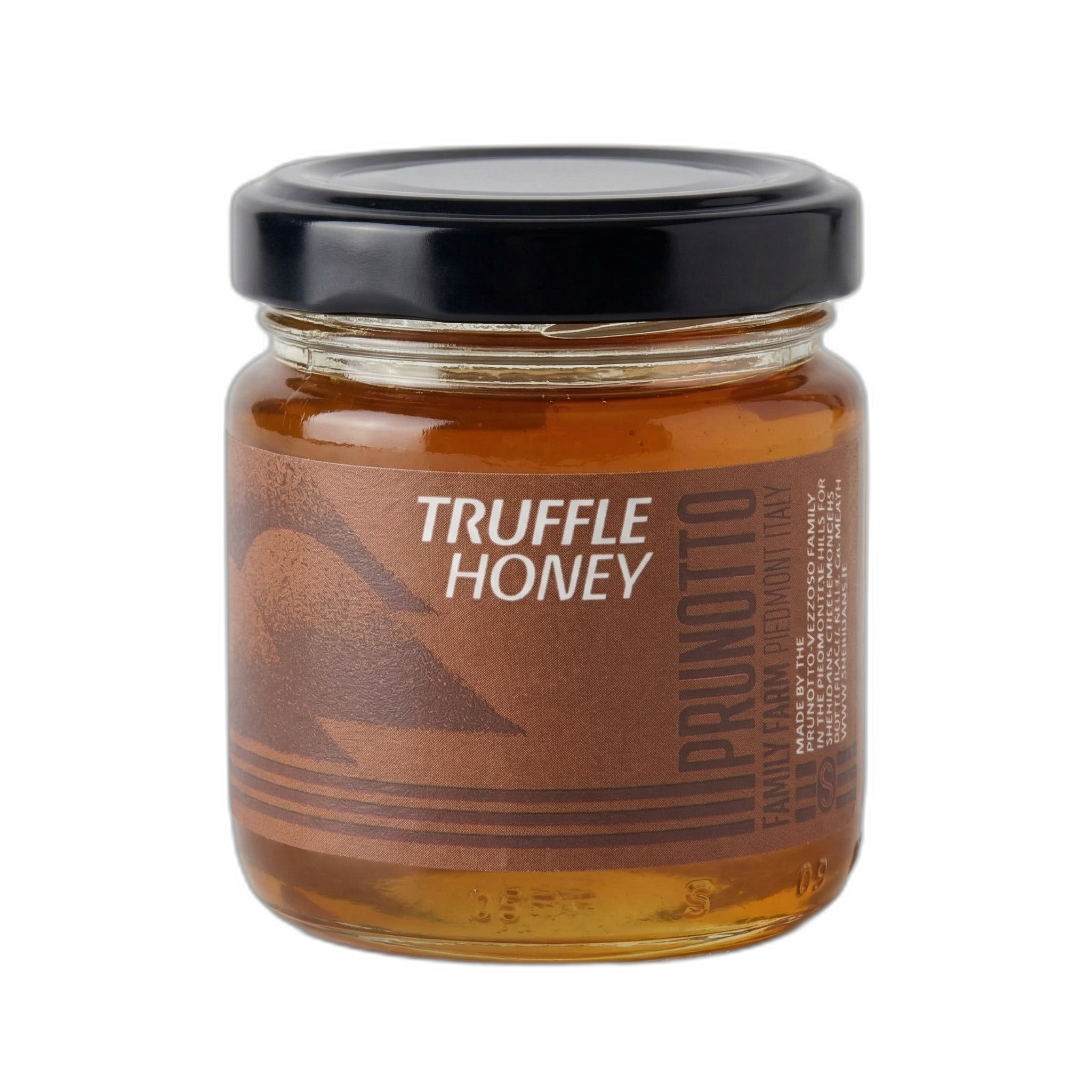 Jar of truffle honey with a black lid on a white background