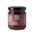 Jar of Prunotto Wild Rose Syrup on a white background