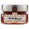 Jar of Membrillo Untable Quince Spread with a silver lid on a white background