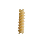 Coiled pasta on a white background