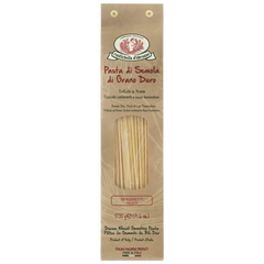 Pasta package with spaghetti sticks on a white background
