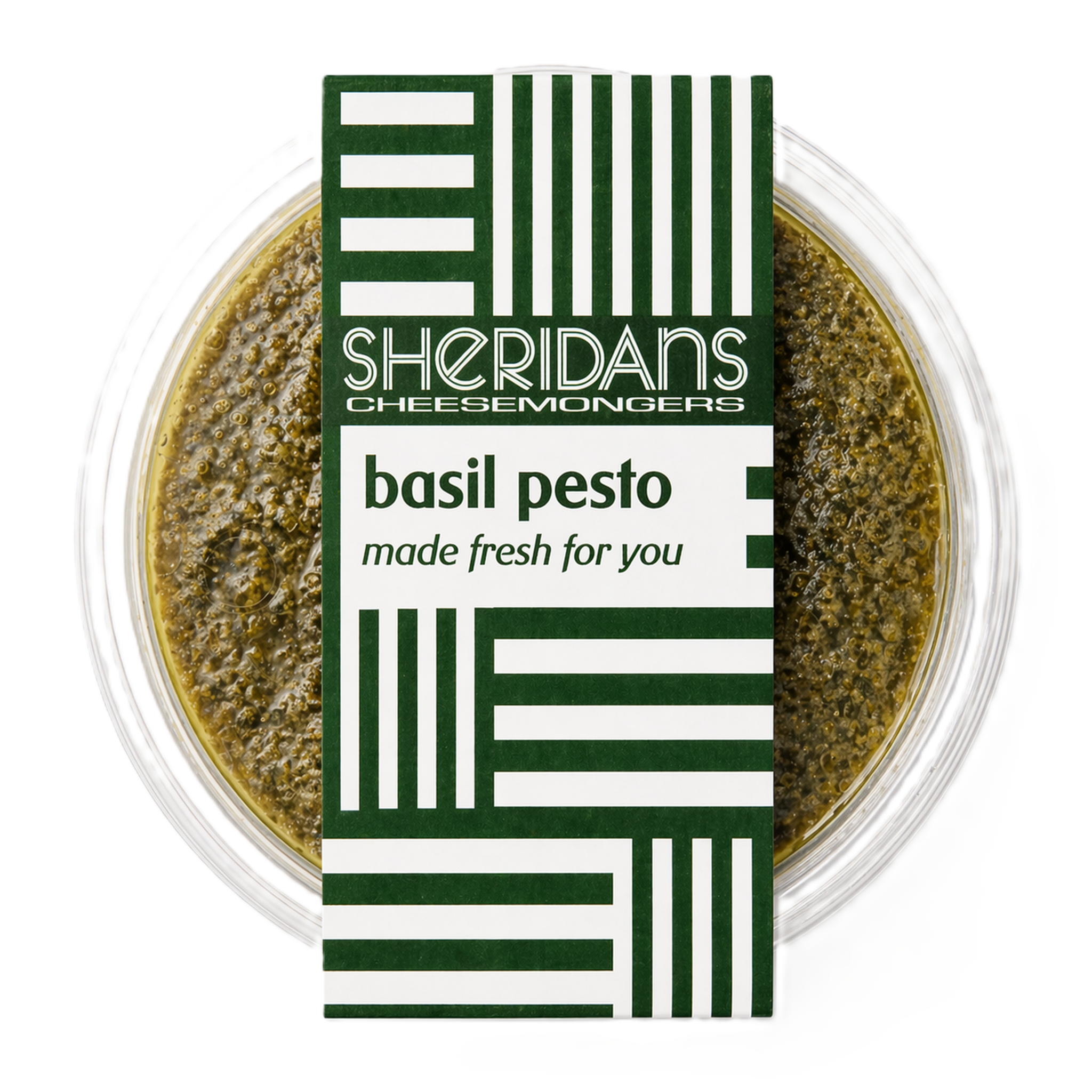 Bowl of basil pesto with Sheridan's Cheesemongers label on a white background
