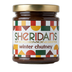 Jar of Sheridan's winter chutney with a colorful label on a white background