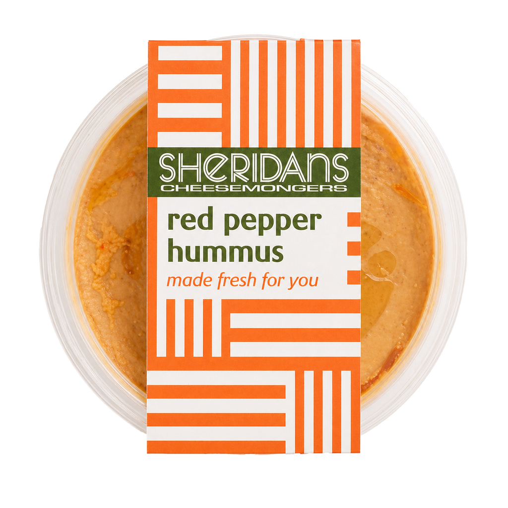 Container of red pepper hummus with Sheridan's Cheesemongers label on a white background