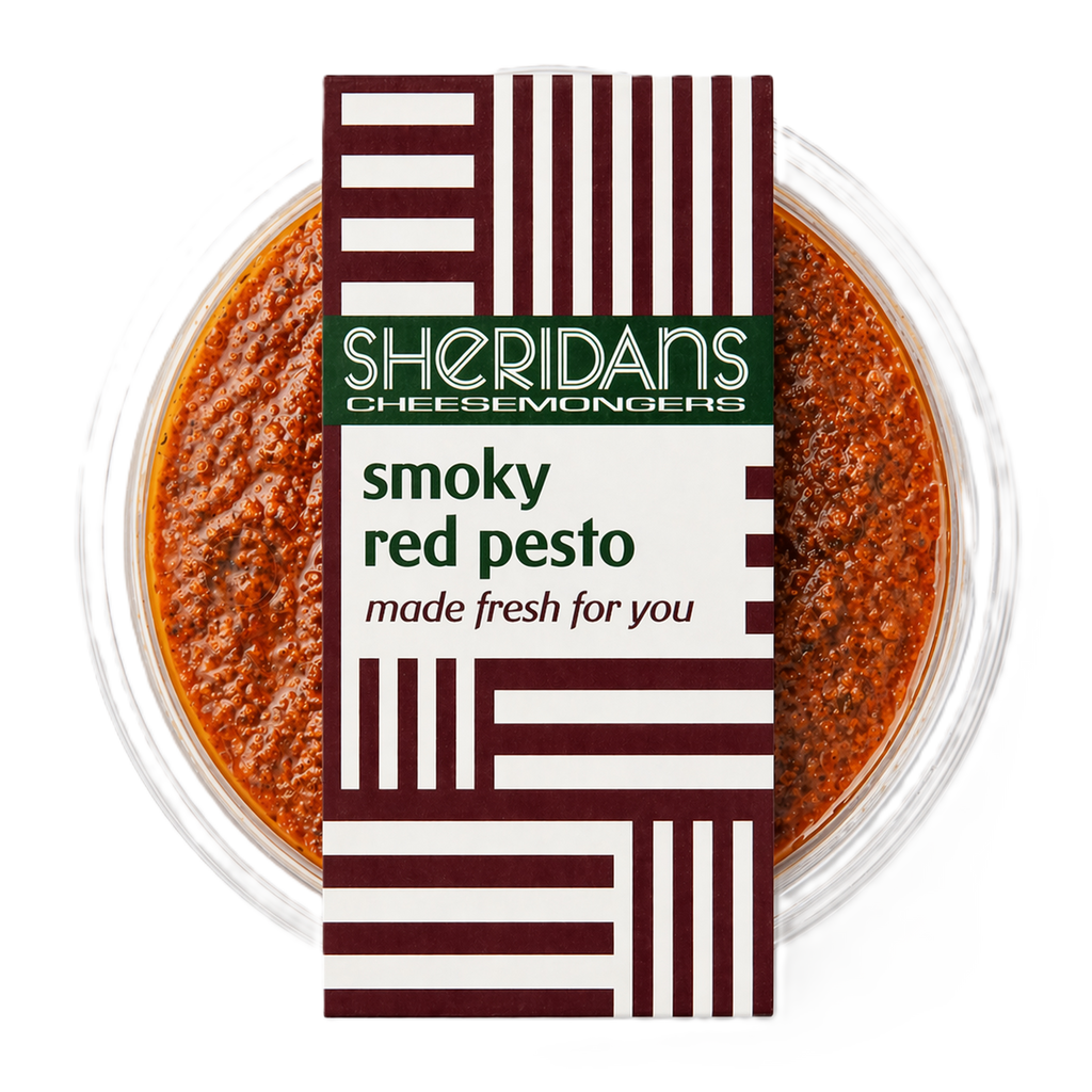 Container of smoky red pesto with Sheridan's Cheesemongers packaging on a white background