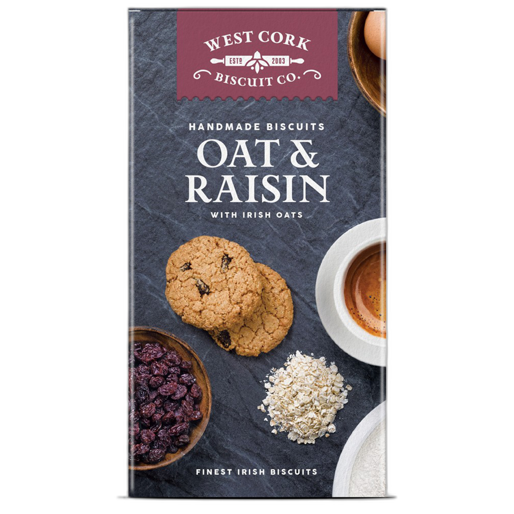 Box of West Cork Biscuit Co. Oat & Raisin biscuits with images of cookies, oats, and raisins on a dark background.