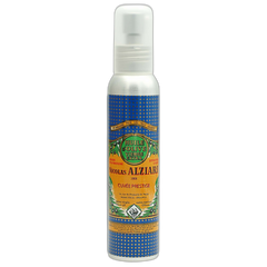 Bottle of Nicolas Alziari olive oil mist on a white background