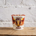 Ponte Reale Burrata Di Bufala container on a wooden surface with a light gray textured background