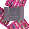 Grá Chocolate Box with colorful chocolate bars on a white background