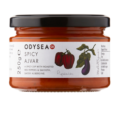 Jar of Odysea Spicy Ajvar with a white label and black lid on a white background