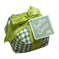 A wrapped gift box with a green and white checkered pattern, tied with a large lime green satin bow and featuring a tag that reads 'Panettone Classico'.