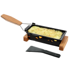 Black raclette grill with wooden handle and spatula on a white background
