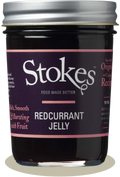 A jar of Stokes Redcurrant Jelly with a dark purple label and silver lid, shown on a white background with a soft shadow.