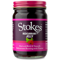 A jar of Stokes Redcurrant Jelly on a plain white background, featuring a dark purple label with pink bands and a pink lid.